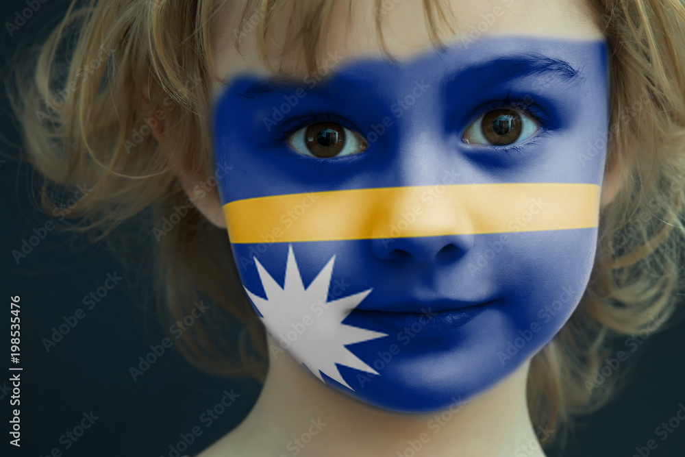 Child with a painted flag of Nauru Child with a painted flag of Nauru