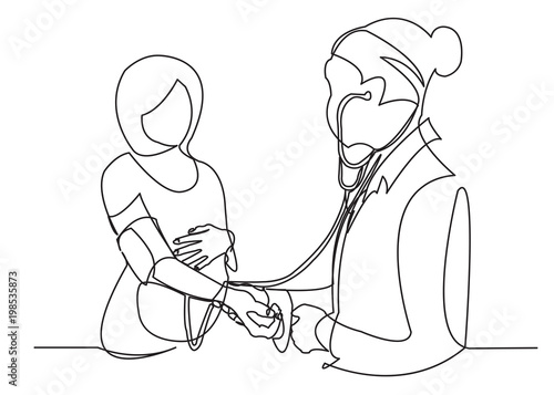 pregnant woman at a doctor's appointment