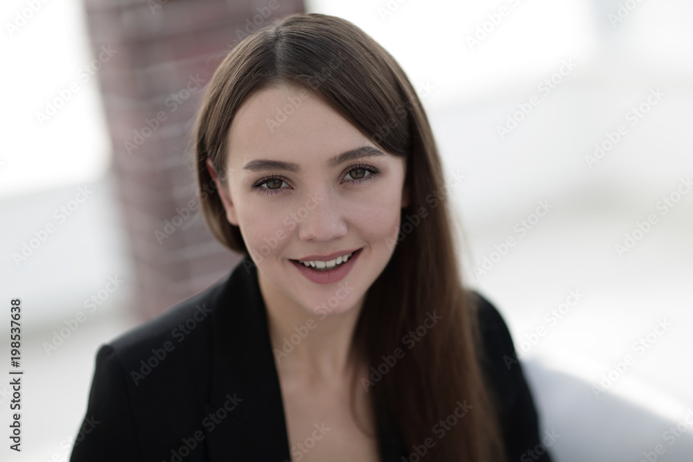 close up portrait of young business woman in modern office close up portrait of young business woman in modern office
