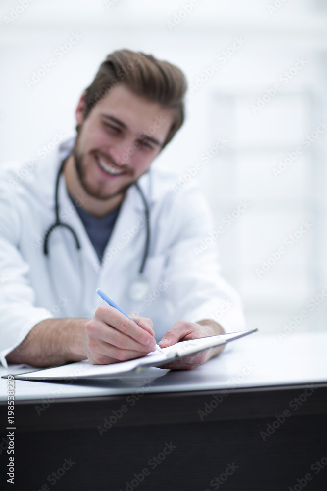 background image of a doctor writing out a prescription background image of a doctor writing out a prescription