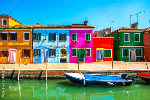 Tela Venice landmark, Burano island canal, colorful houses and boats, Italy
