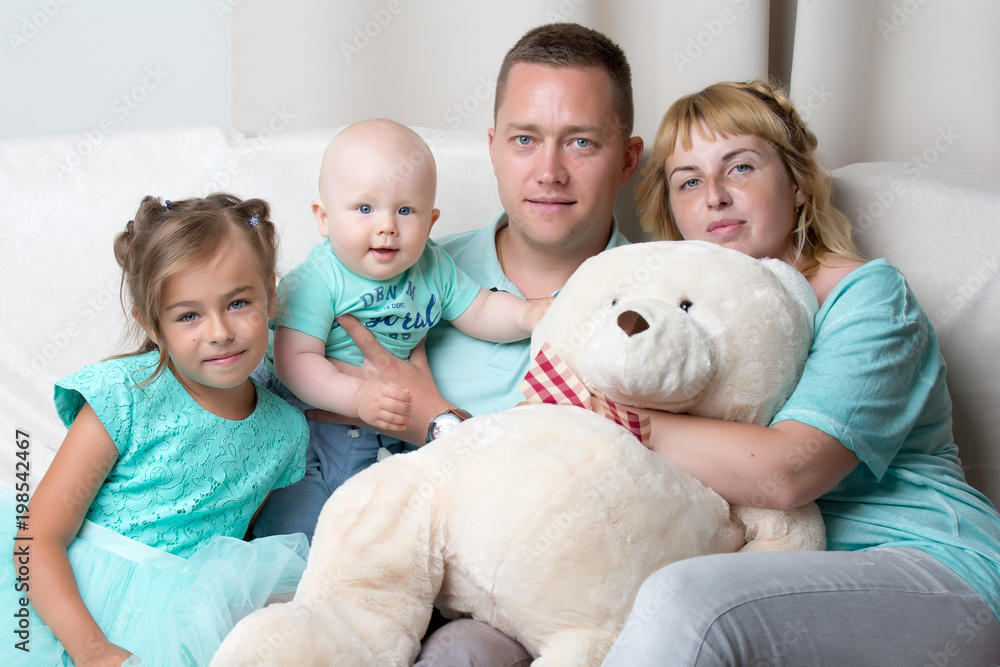Happy family with young children Happy family with young children