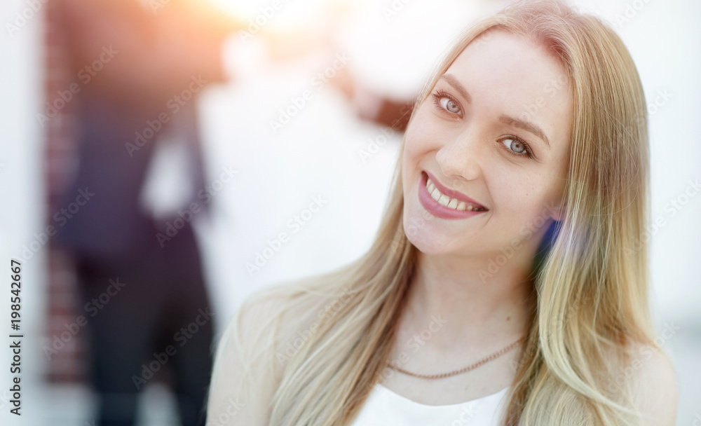 close-up portrait of a young woman against the background of col close-up portrait of a young woman against the background of col