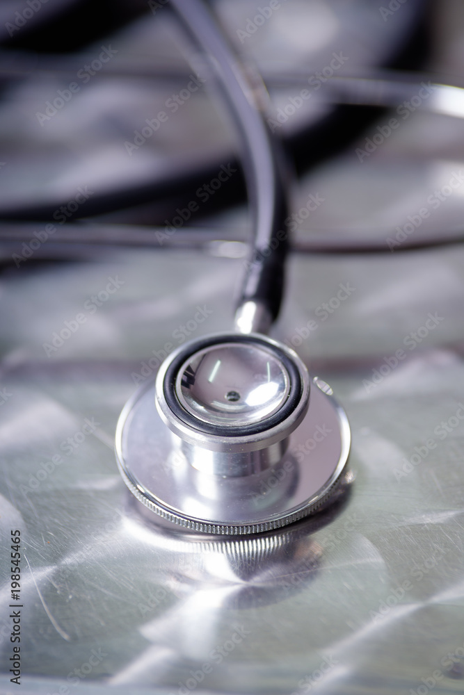 Close up stethoscope for doctor and medical nursing people in hospital, medical concept Close up stethoscope for doctor and medical nursing people in hospital, medical concept