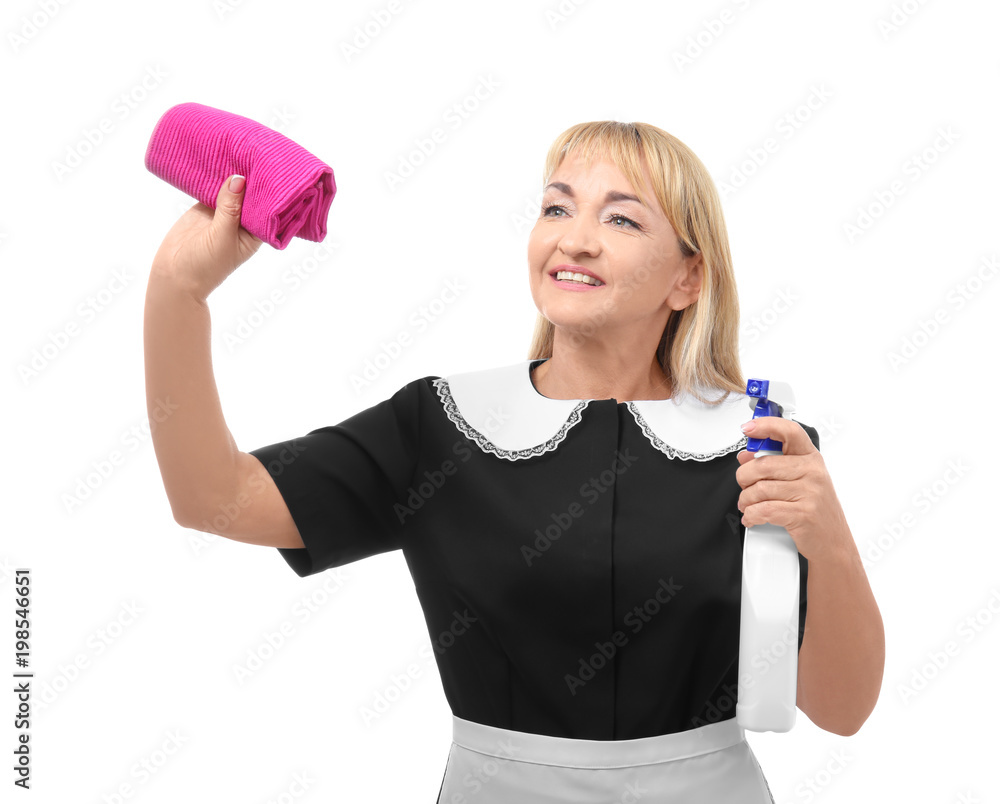 Portrait of mature woman in uniform with detergent and rag on white background Portrait of mature woman in uniform with detergent and rag on white background