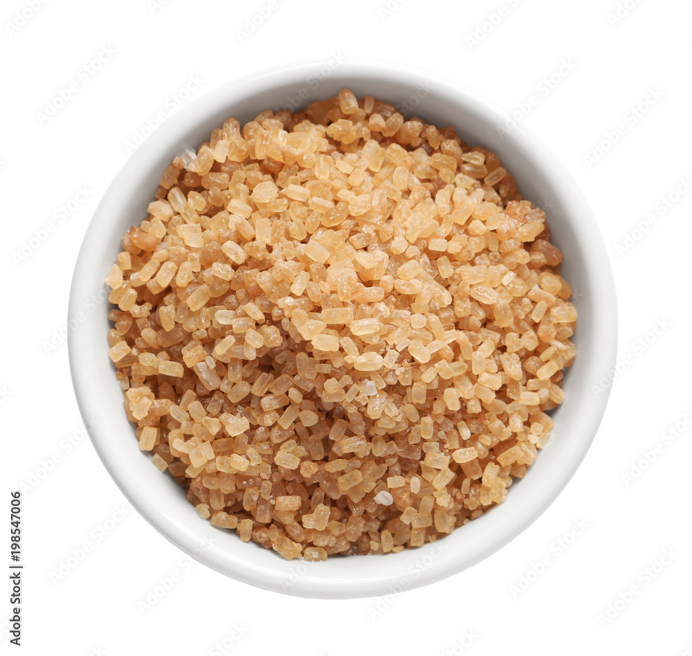Bowl with brown sugar on white background Bowl with brown sugar on white background
