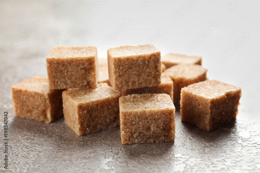 Cubes of brown sugar on table Cubes of brown sugar on table