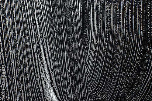 Foam texture on a black ceramic surface