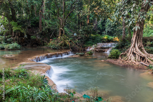 Water flowing at Than Sawan waterfall photo