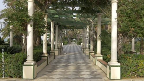 A colonnade in a park photo