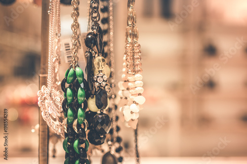 Display of various jewelry in store. Asia. photo