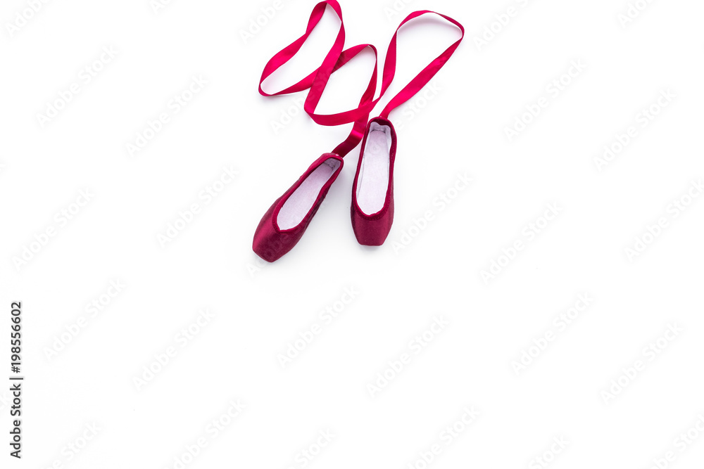 Professional dance shoes. Ballet concept. Pointes on white background top view copy space Professional dance shoes. Ballet concept. Pointes on white background top view copy space