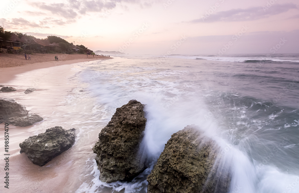 Amazing view of Yogyakarta seascape with natural coastal rock as foreground