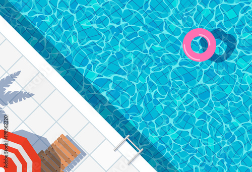 swimming pool top view background. water ring umbrella lounger photo
