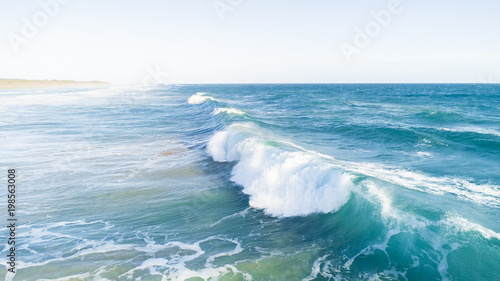 Fototapeta Naklejka Na Ścianę i Meble -  Aerial View of Waves and Beach Along Great Ocean Road Australia at Sunset