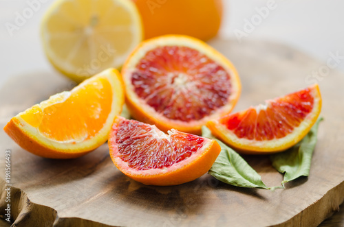 Sliced oranges  on the wooden table. Citrus sinensis orange