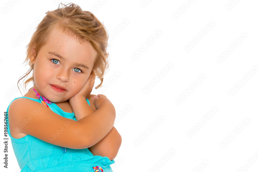 The little girl folded her hands around her face. The little girl folded her hands around her face.