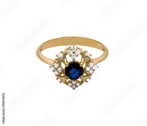 Very beautiful golden ring with big sapphire and diamonds