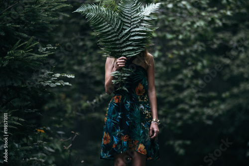 Young woman in beautiful dr...