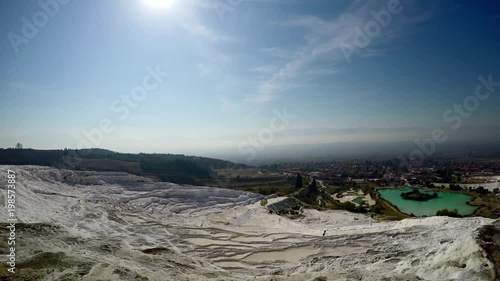 Famous place travertine terraces and pool in Pamukkale at Turkey.