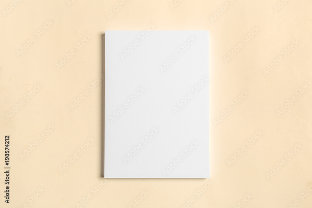 White business card on wooden table. Blank portrait A4. White business card on wooden table. Blank portrait A4.