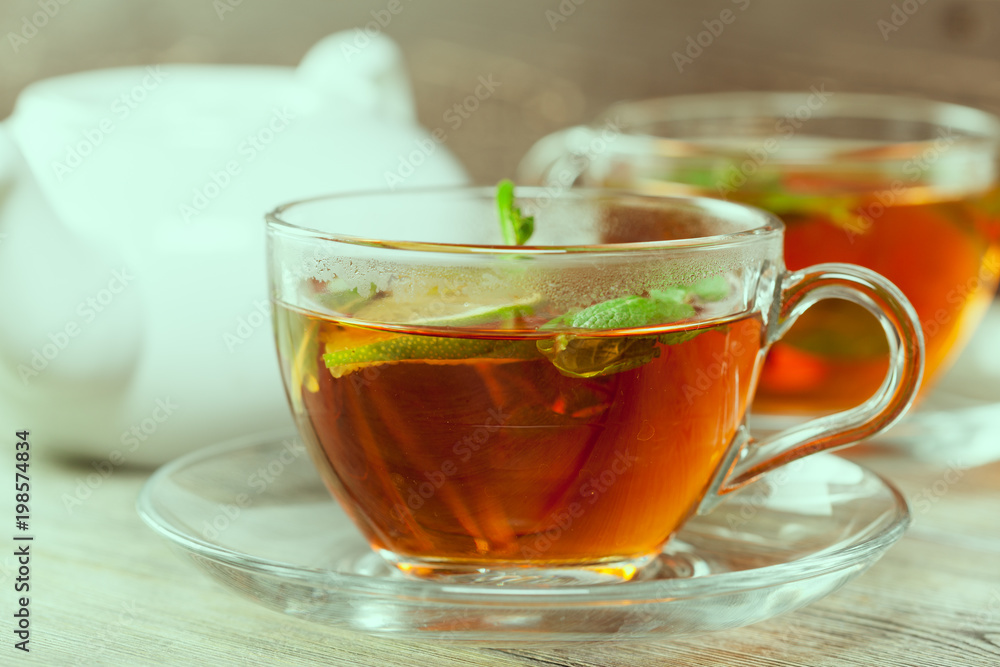 Cup of tea on wooden table Cup of tea on wooden table