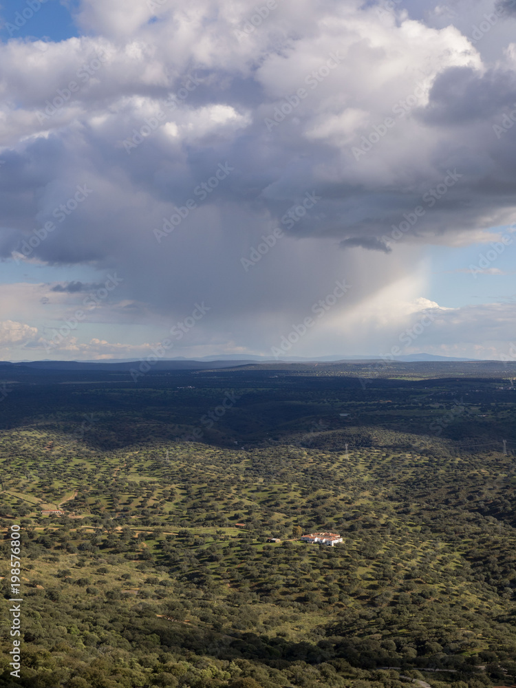 Storm clouds over the field, raining in Cáceres province, Extremadura, Spain