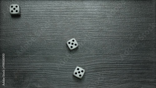 Poker Dice rolling three of a kind on five