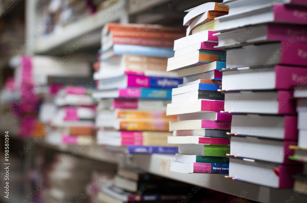 piles of books on the shelves of the archive piles of books on the shelves of the archive