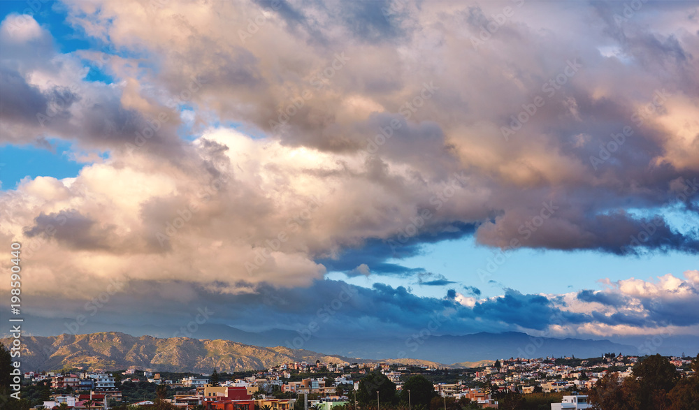 amazing dramatic cloudy sunrise over the city and beautiful dramatic sky with clouds in small bay. Chania city , Crete, Greece amazing dramatic cloudy sunrise over the city and beautiful dramatic sky with clouds in small bay. Chania city , Crete, Greece