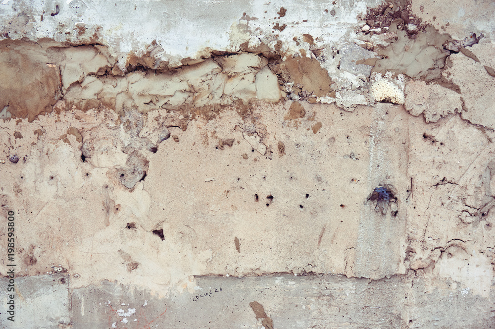 Concrete background with cracks and irregularities. Abstract background