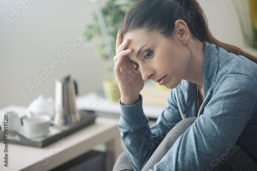 Depressed woman at home