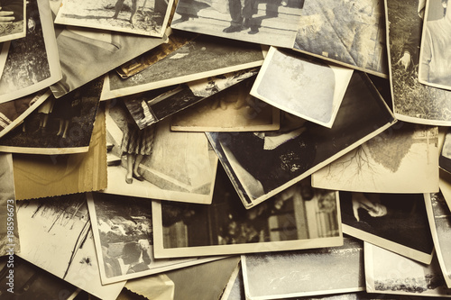 old photos on the wooden table photo