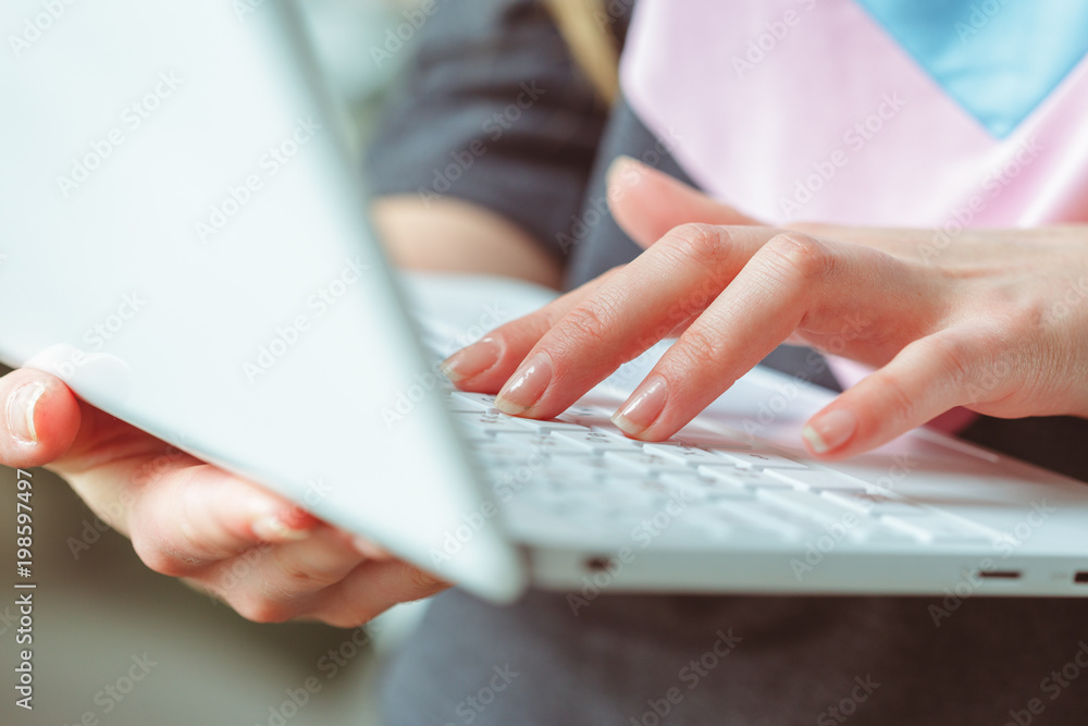 Fototapeta premium Young Woman Using Laptop