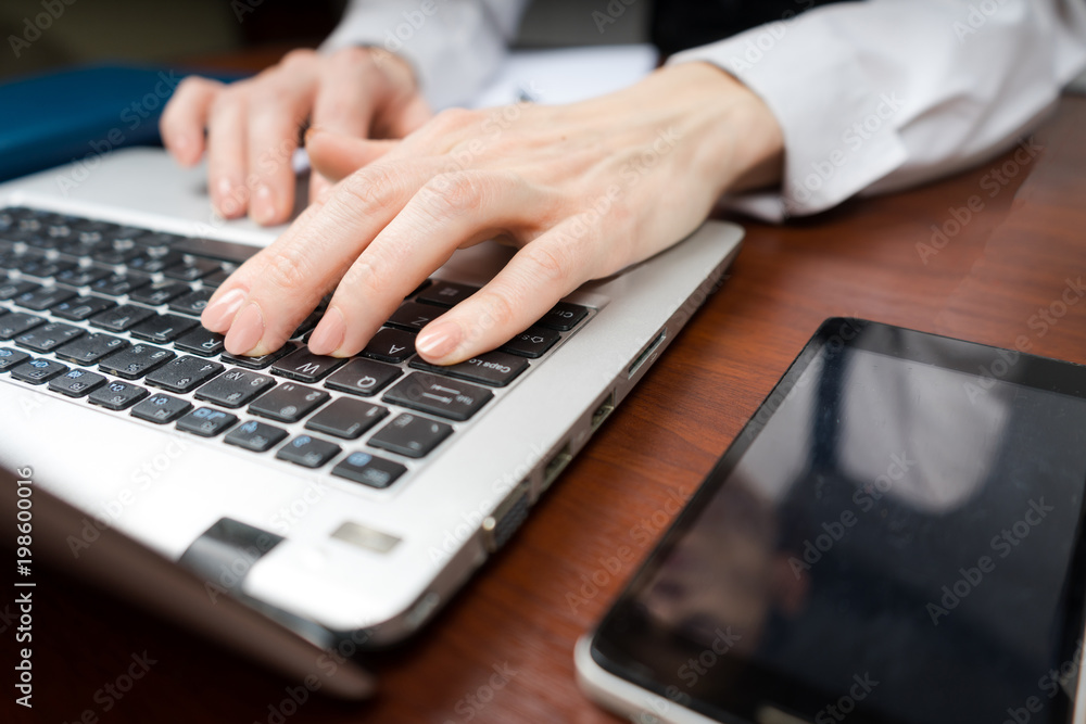 Closeup of a female hands busy typing on laptop. Copy space. Closeup of a female hands busy typing on laptop. Copy space.