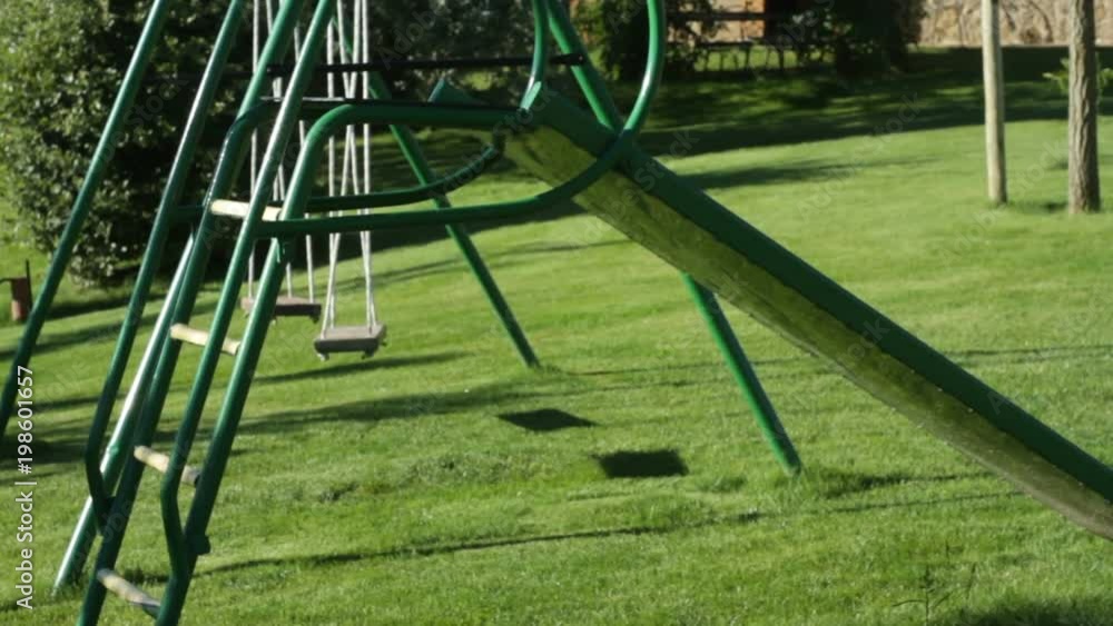 Children's Slide In A Completely Green Garden Children's Slide In A Completely Green Garden