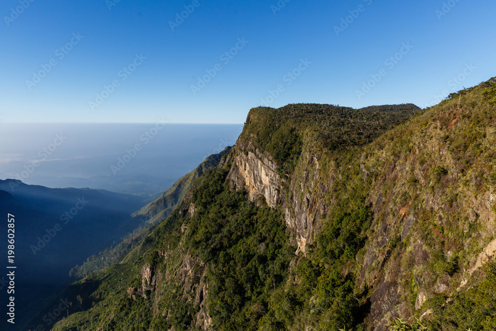 beautiful scenic view of mountains covered with green plants and clear blue sky, sri lanka, horton plains beautiful scenic view of mountains covered with green plants and clear blue sky, sri lanka, horton plains