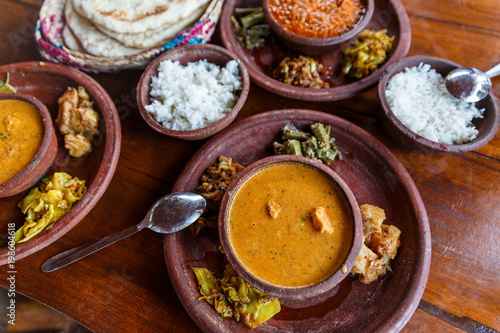 Fotografie close up view of traditional asian food on wooden tabletop, sri lanka