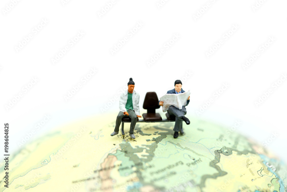Miniature people : traveler with world map, backpack and travel concept. Miniature people : traveler with world map, backpack and travel concept.