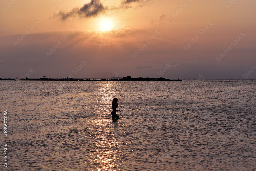 Attractive Woman Enjoying On The Sea At Sunset, Glyfada, Athens, Greece