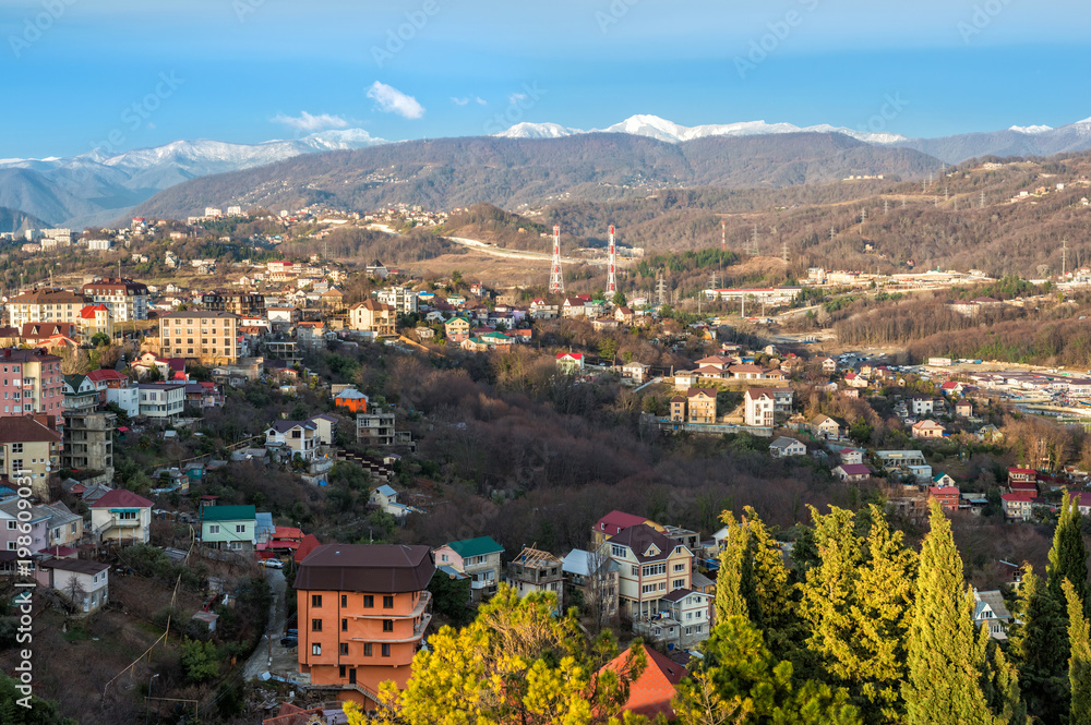 Дома и горы в Сочи. Вид с высоты. A view of the houses and mountains of Sochi