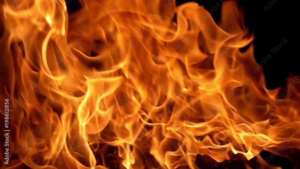 Flames of fire on black background in slow motion Flames of fire on black background in slow motion