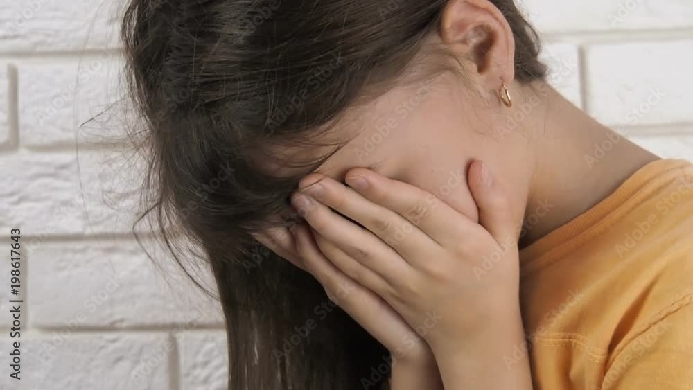 The unfortunate child. The little girl is crying. The child is depressed. The unfortunate child. The little girl is crying. The child is depressed.