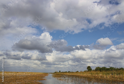 Everglades marsh landscape under cloudy skies