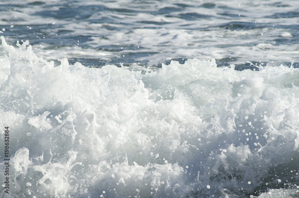 Fototapeta premium Foam and drops of breaking sea waves Black Sea