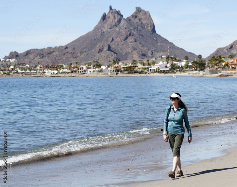 A Woman Walks the Beach, Tetakawi Mountain Behind, San Carlos, Mexico
