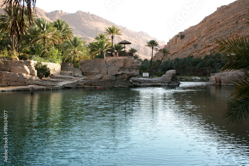 beautiful emerald pools of Wadi Bani Khalid in Oman photo