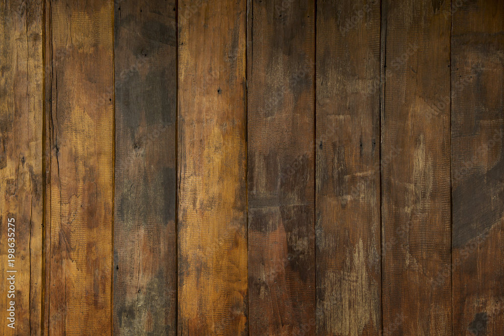 Naklejka premium Background and Wallpaper or texture of floor old brown hardwood or panels plank wood texture panel Vertically.