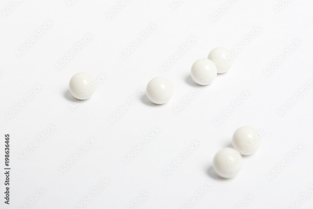 airsoft bbs balls on white background airsoft bbs balls on white background