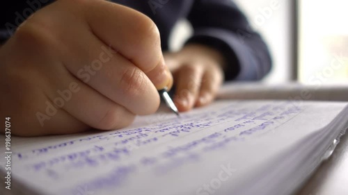 Wallpaper Mural Child hands writing a letter, close up 4K Torontodigital.ca